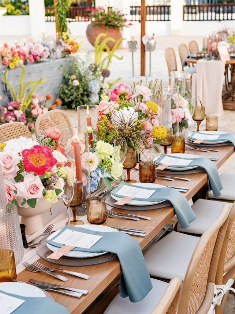 Colourful wedding table flower arrangements